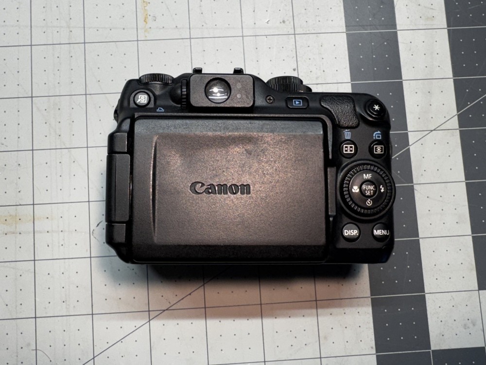 Canon PowerShot G12 10MP Digital Camera (read)
