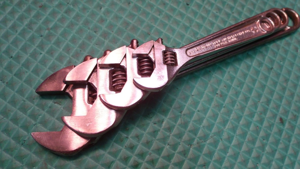 4 PCS. "DIAMALLOY" U.S.A. ADJUSTABLE END WRENCHES