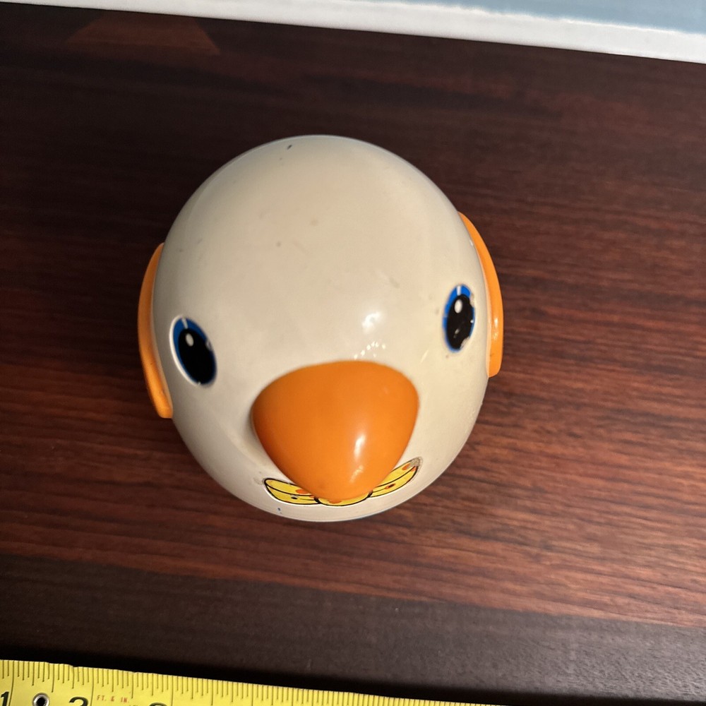 Vintage Musical Roly Poly Penguin pull behind toy