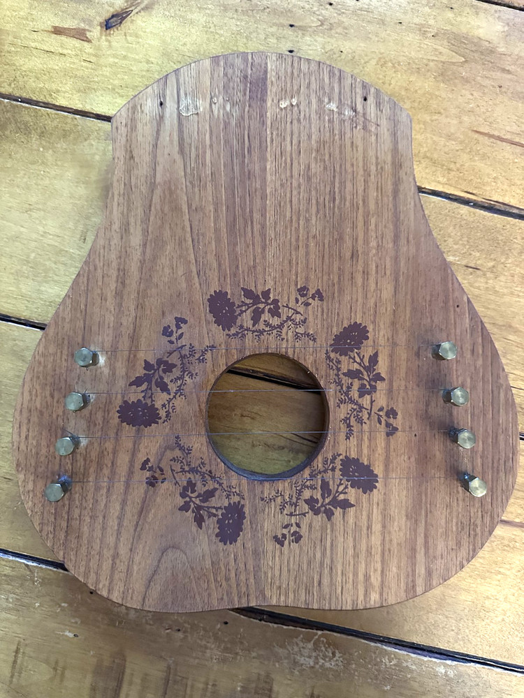 Rustic Floral Wooden String Instrument
