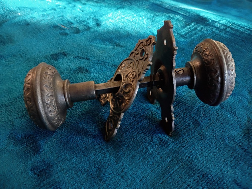 Antique  Cast Iron Door Knobs & Back Plates Set .