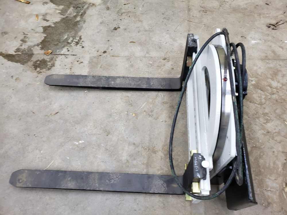 Skidsteer Bobcat fork rotator--- NEW WITH WARRANTY!!!