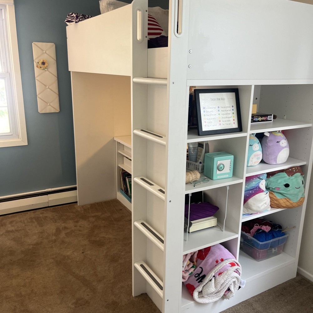 ikea loft bed with extra shelving and desk