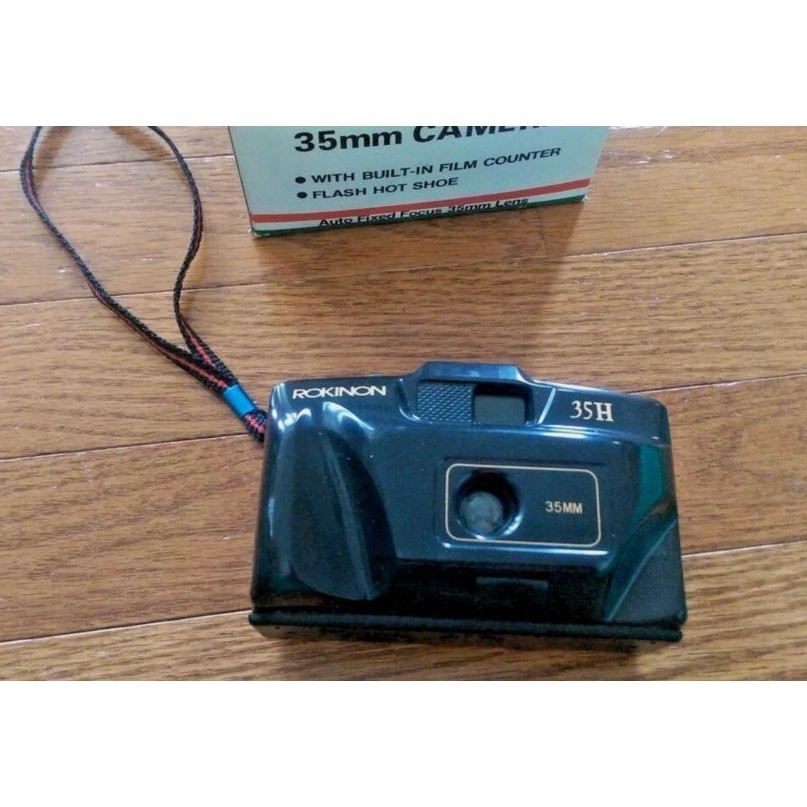 Camera Bundle - Kodak Disk 4100 Camera, Rokinon 35mm, Polaroid Flashgun #268