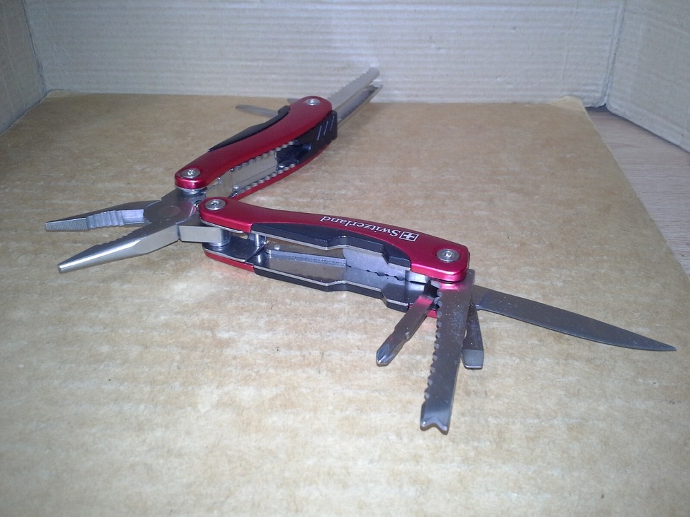 Switzerland Red Multitool Folding Pocket Pliers. VGC