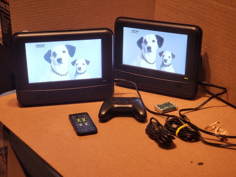 RCA 7" DOUBLE PLAY MOBILE DVD SYSTEM DUAL SCREENS GAME W/CONTROLLER DRC62705E24G