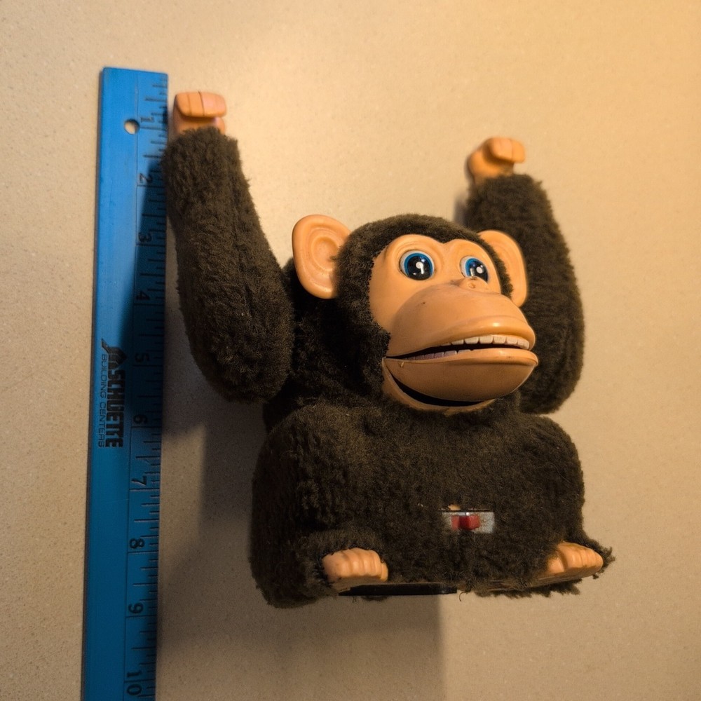 Antique Collectable Swinging Monkey ( Battery compartment needs cleaning)
