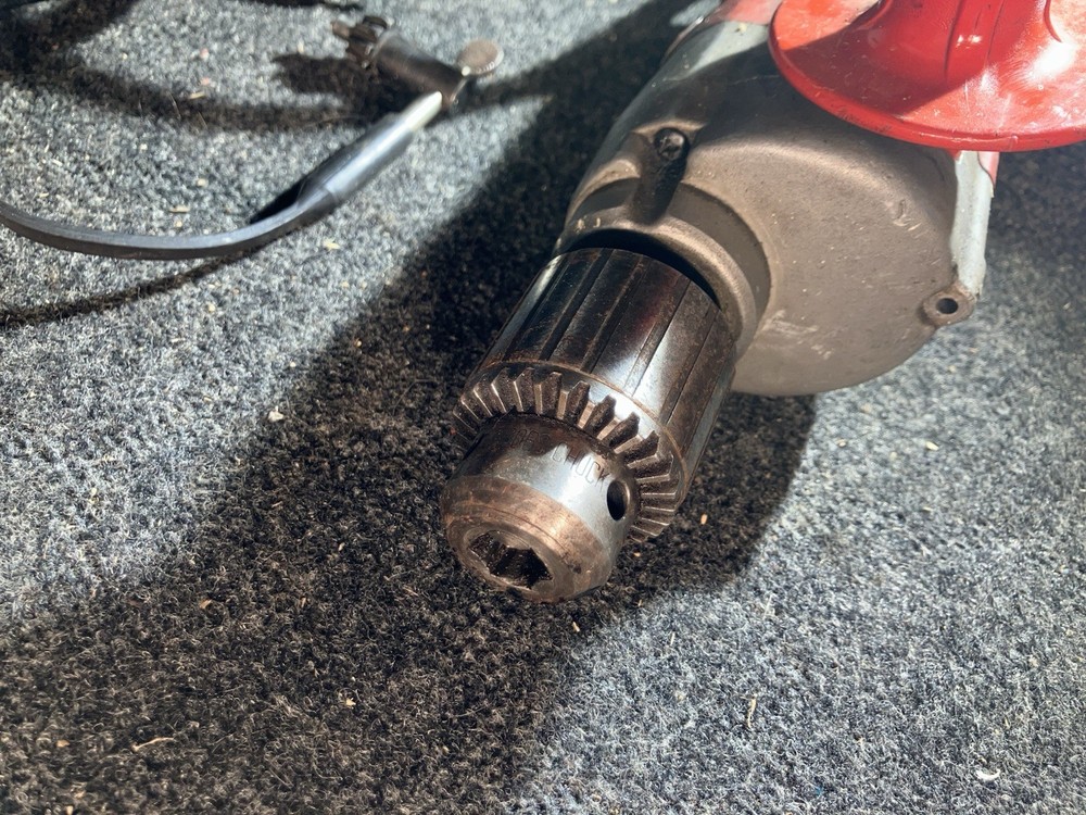 Milwaukee Electric Drill with Side Handle Attachment