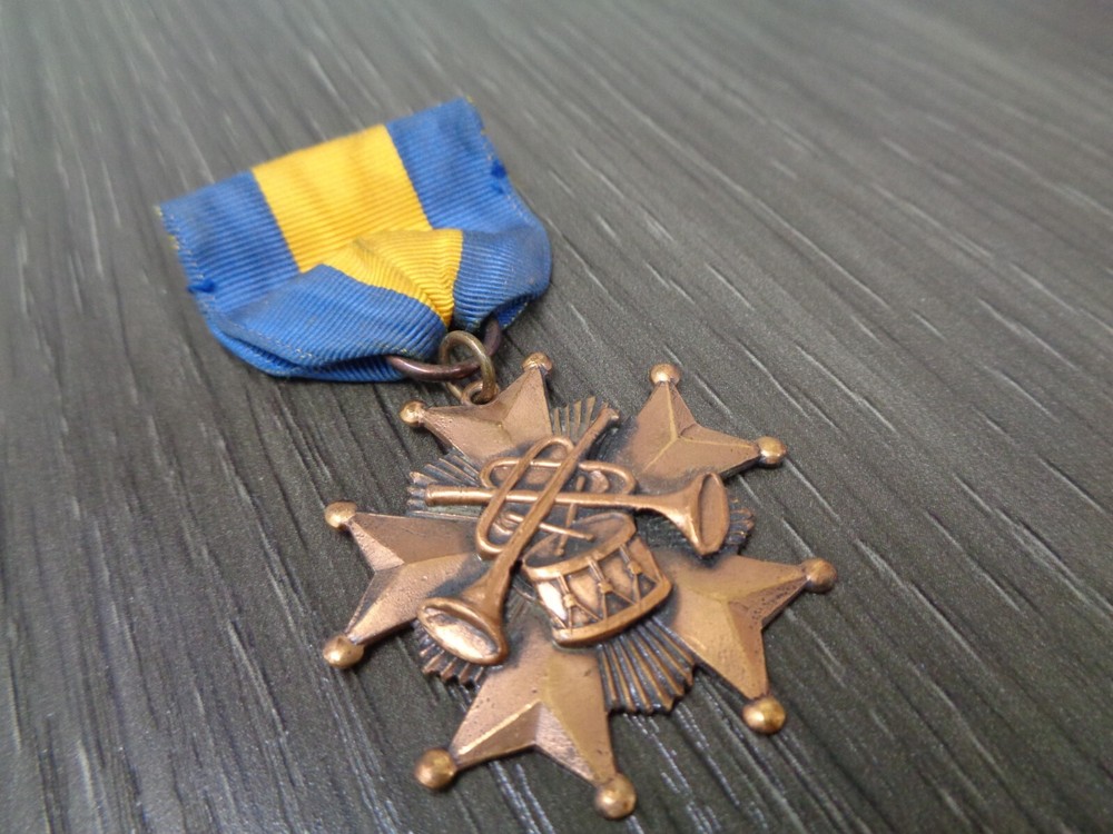 Vintage Bugle Roster Medal DISTINGUISHED