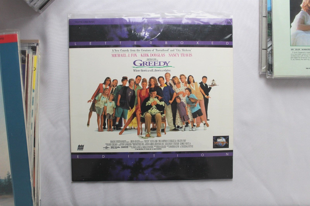 GREEDY laserdisc LD LETTERBOX EXTENDED PLAY MICHAEL J. FOX *QUICK SHIP*