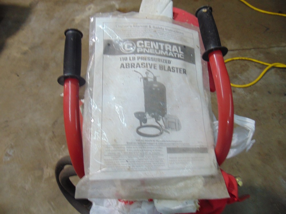 Grip On Pressurized Abrasive Blaster