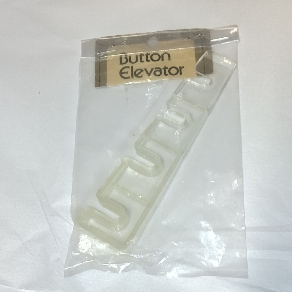 Button Elevator for Effortless Sewing W. H. Collins Inc
