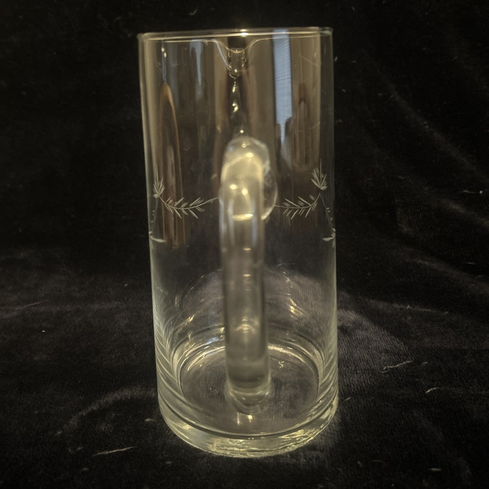 This is a vintage etched glass pitcher with a wheat pattern.