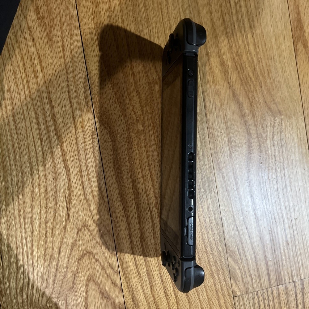 Nintendo Switch Console W/ Dock, Joycon Grip, & Joycons “READ”