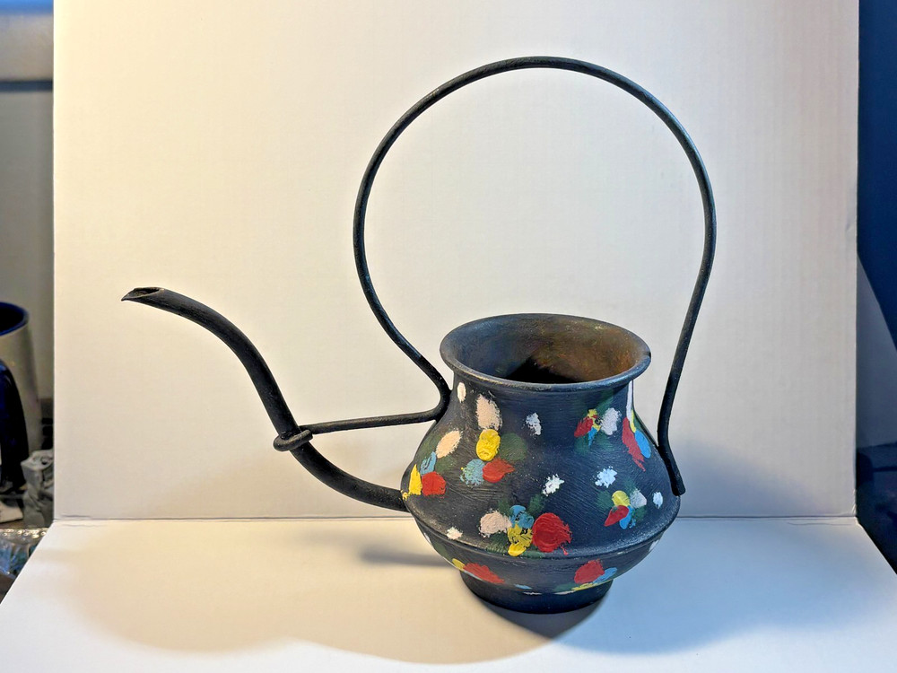 Hand painted decorative copper watering can.  8" tall.  Light rust inside.