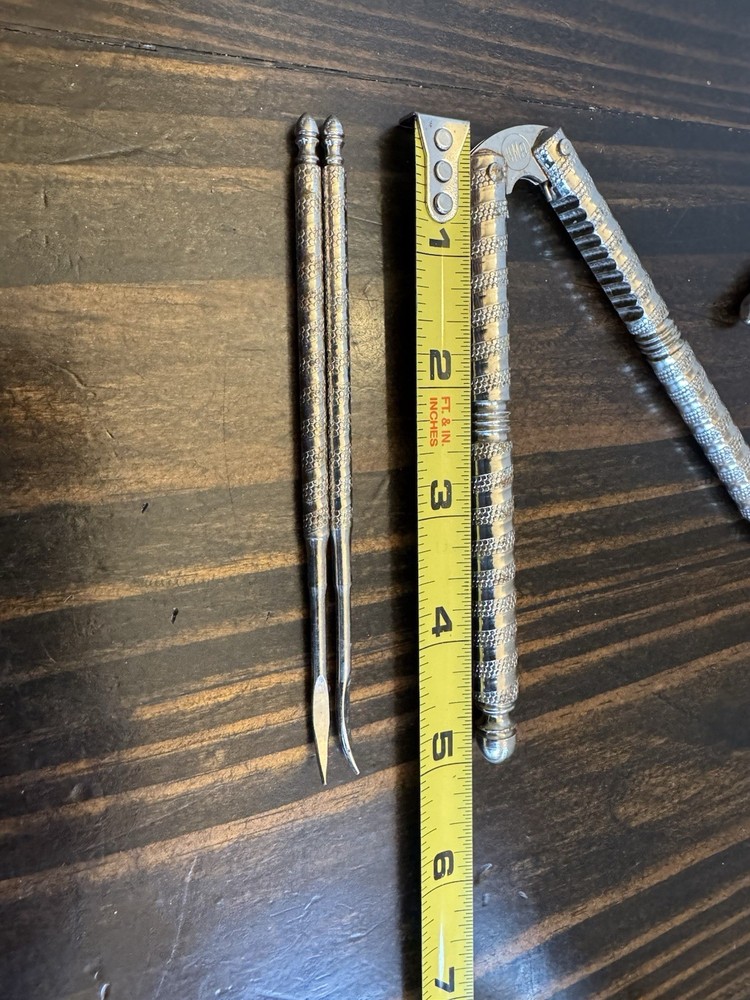 Vintage HMQ Manual Spring Jointed Nutcracker and 2 Picks