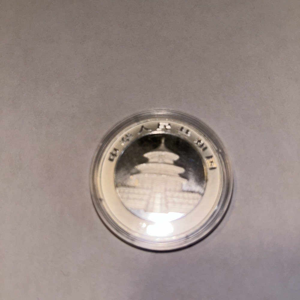 2000 China Panda Silver 1 Oz. Coin Colored In Capsule.