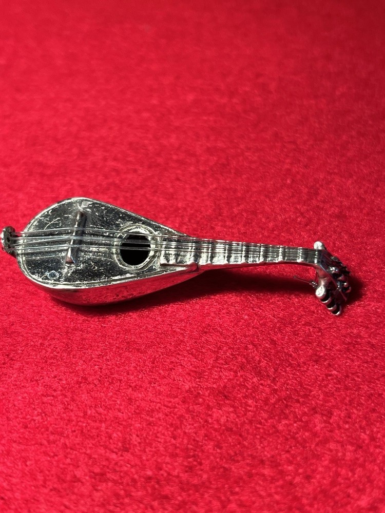 silver miniature 800 mandolin w/ seperate strings