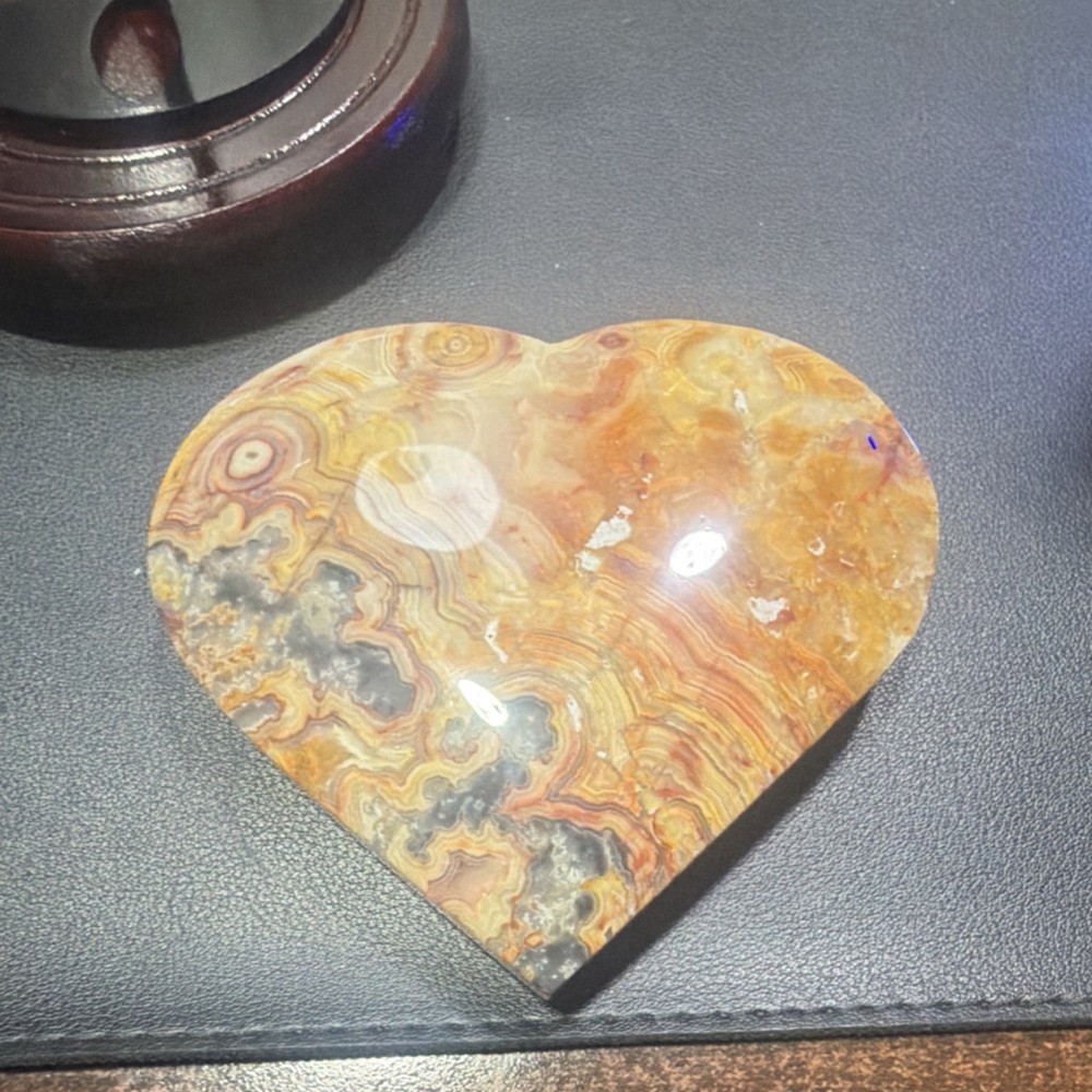 Heart-Shaped Stone Carving with Decorative Stand