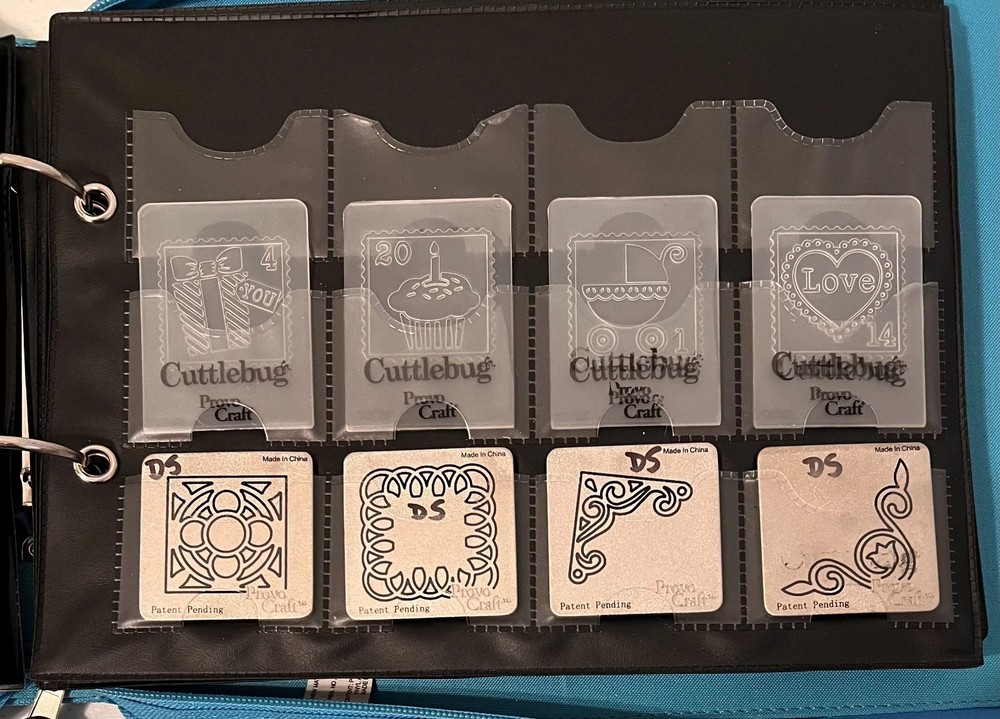 Cuttlebug Storage Binder + 42 Cutting and Embossing Folders + 7 Pouch Page Lot