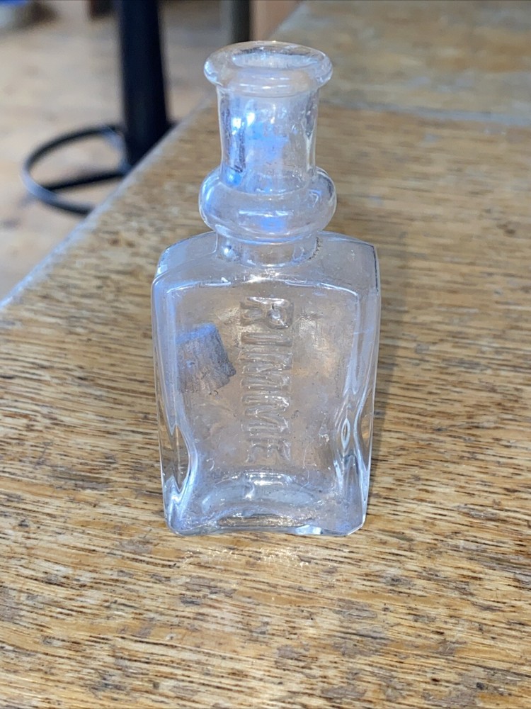 E. RIMMEL' colourless glass perfume bottle