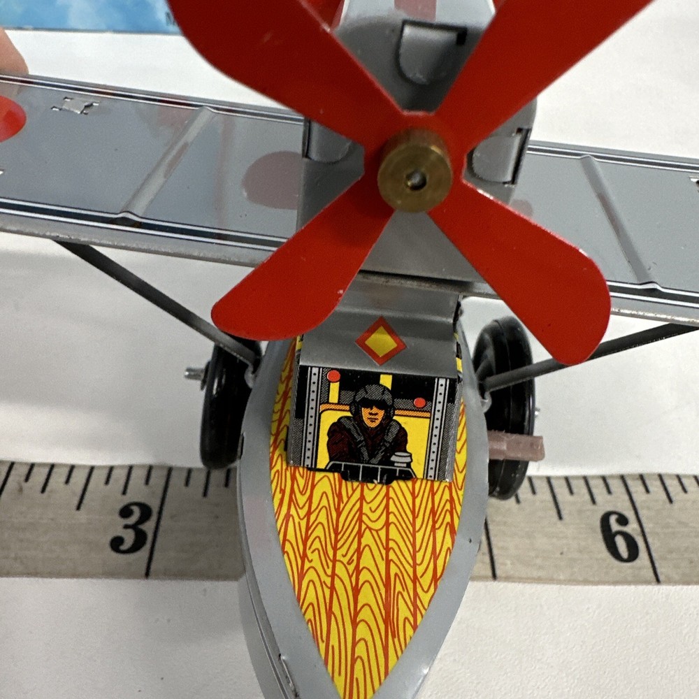 Supt Propeller Plane (We could not get this to work) Small Tin plane