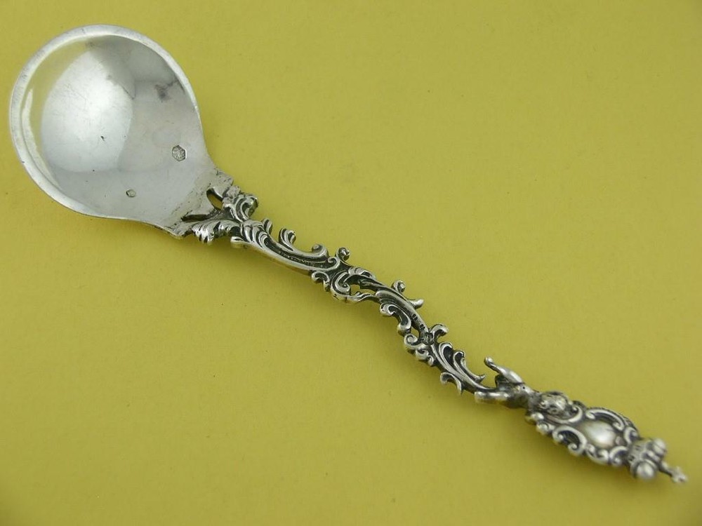 Old Dutch .833 Silver Figural Serving Spoon cherub / putti & scrolls c1895
