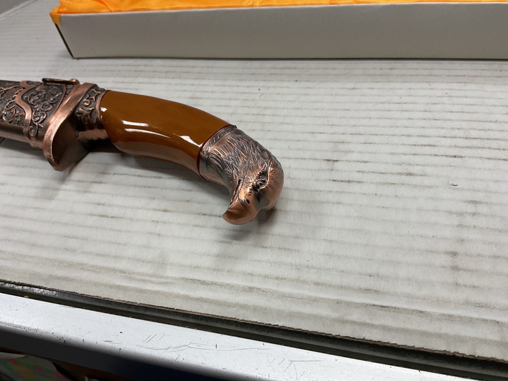 dagger with sheath gold color and eagle design