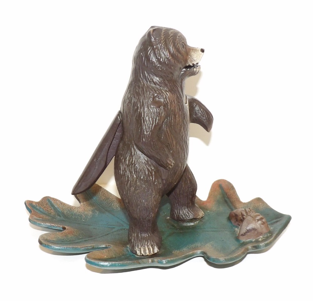 WONDERFUL M.I. CAST IRON BEAR STANDING ON LEAF NUTCRACKER