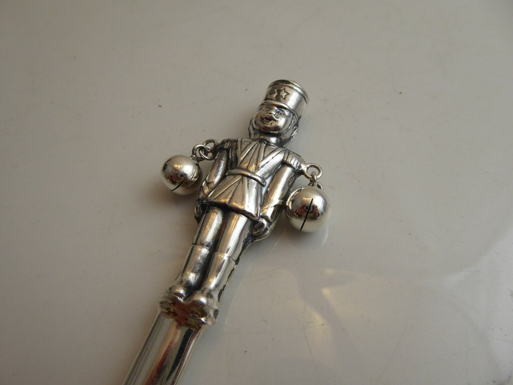 SOLID SILVER NOVELTY BABY RATTLE IN FORM OF A SOLDIER