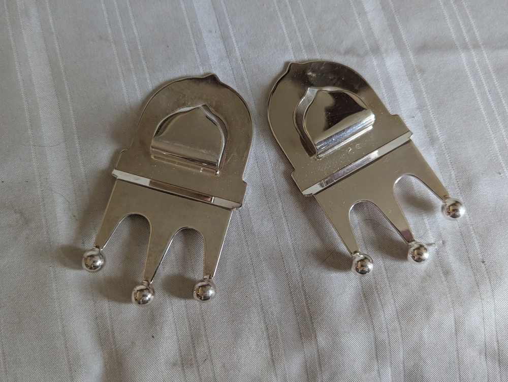 Neiman Marcus pair silver plated crown bottle openers