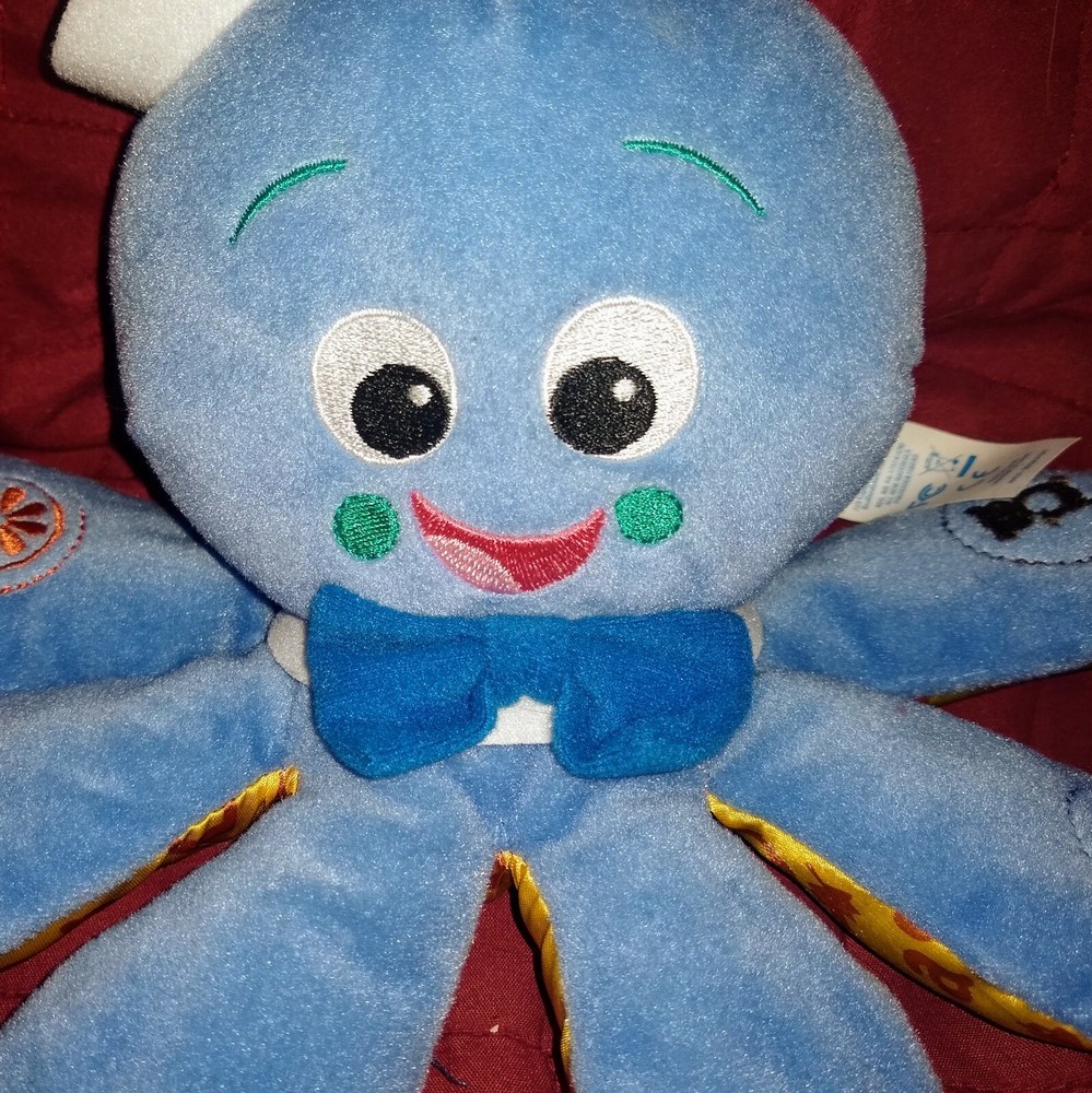 Baby Einstein OCTOPLUSH OCTOPUS Tri-Lingual Musical Blue Plush Colors Objects
