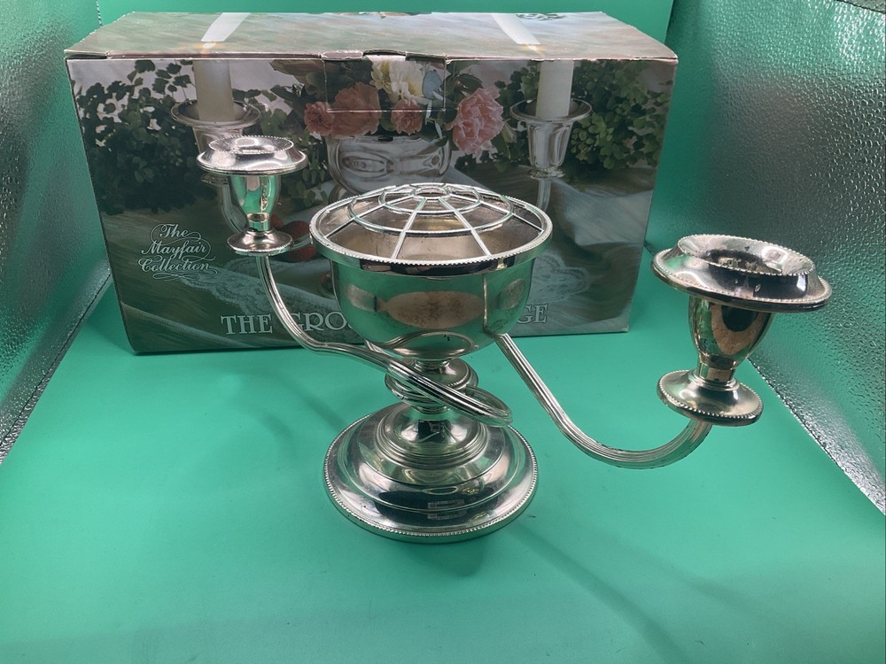 Good silver plated three armed Candelabra, made in England.