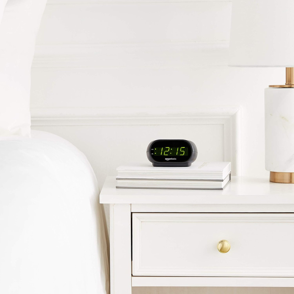Amazon Basics Small Digital Oval Alarm Clock with LED Display, Nightlight, Snooz