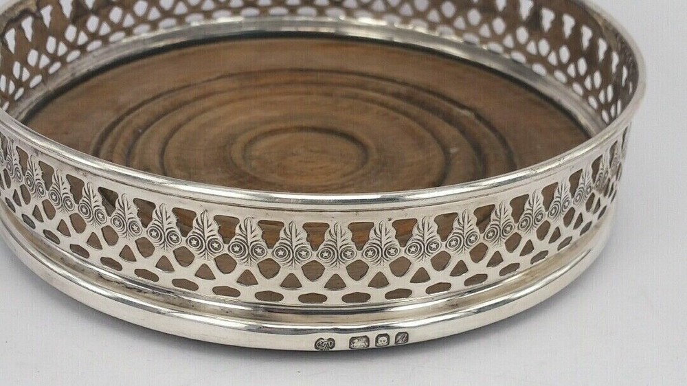 Gallery Silver bottle coaster 5 inch in diameter by C J Vander