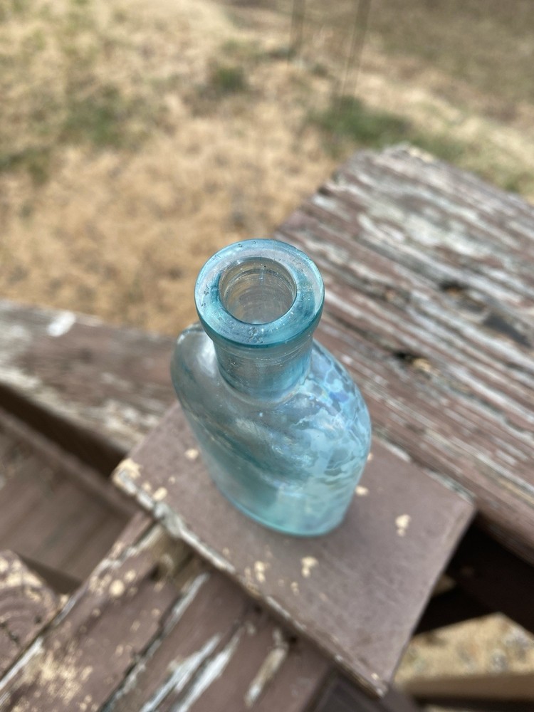 Week’s Snow Flake Blue Antique Bottle
