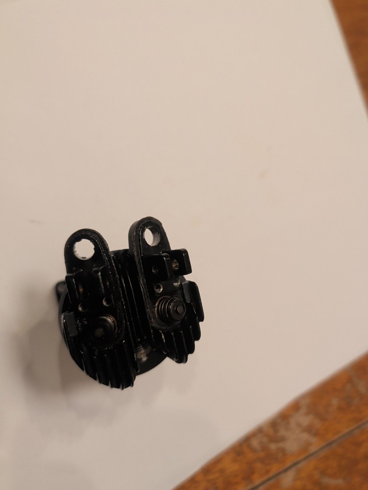 Saito FA 56 Cylinder Head. Valve Assembly