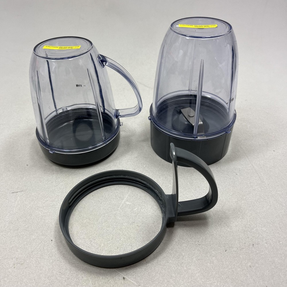 LOT OF 2 NUTRIBULLET CUPS, 1 BLADE BASE LID and HANDLE FOR 4" BASE