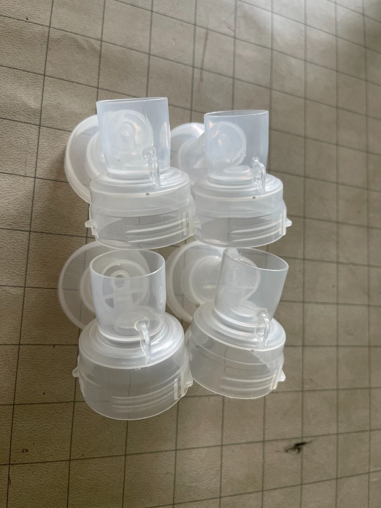 (4) New Medela connectors (2 pair)