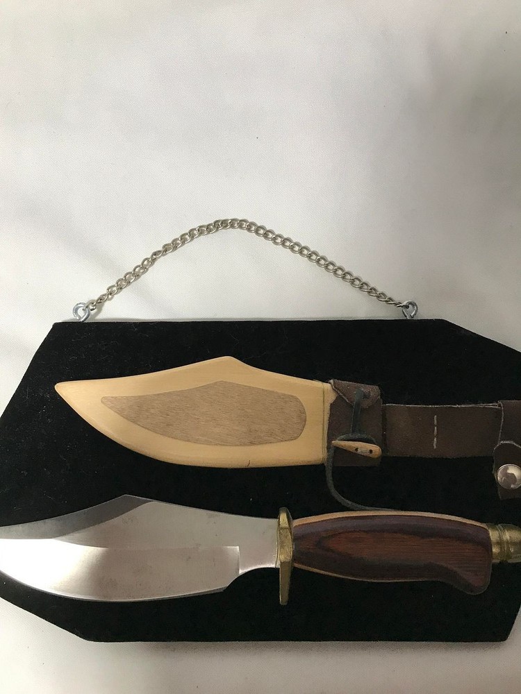 Bowie Knife  &  sheath, on display rack