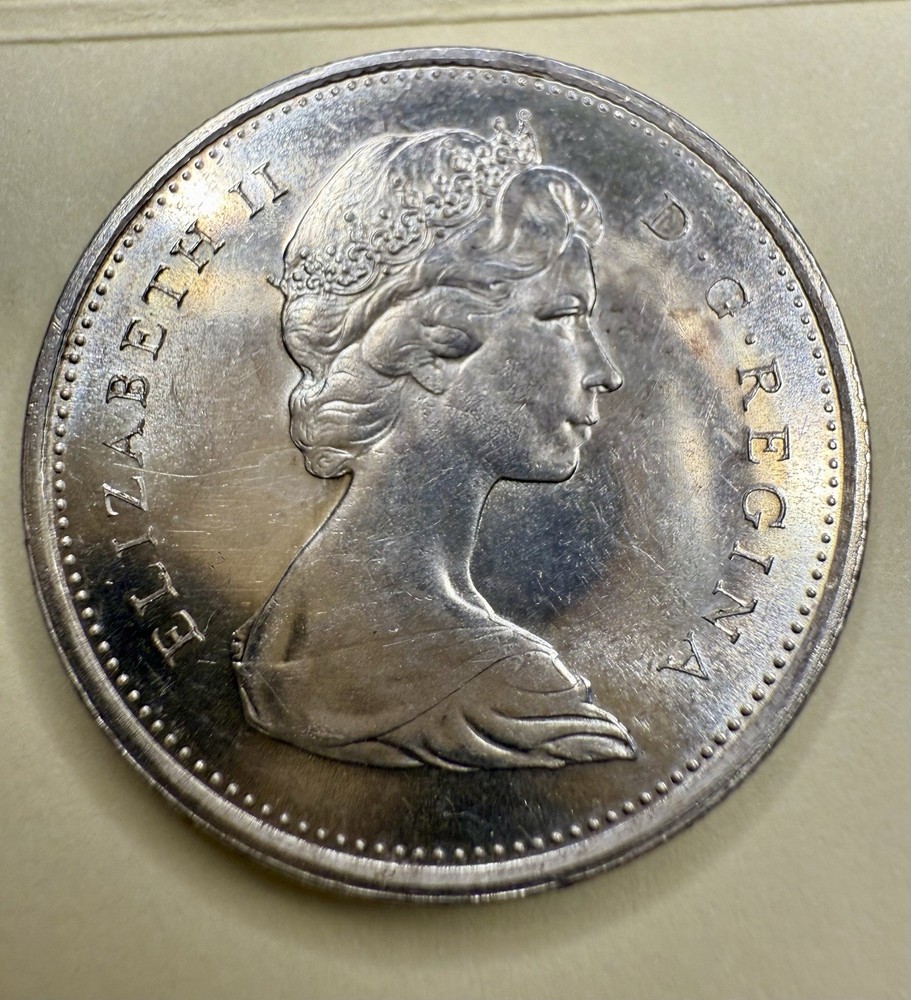 1967 Canada Silver Quarter • Centennial Lynx • Brilliant