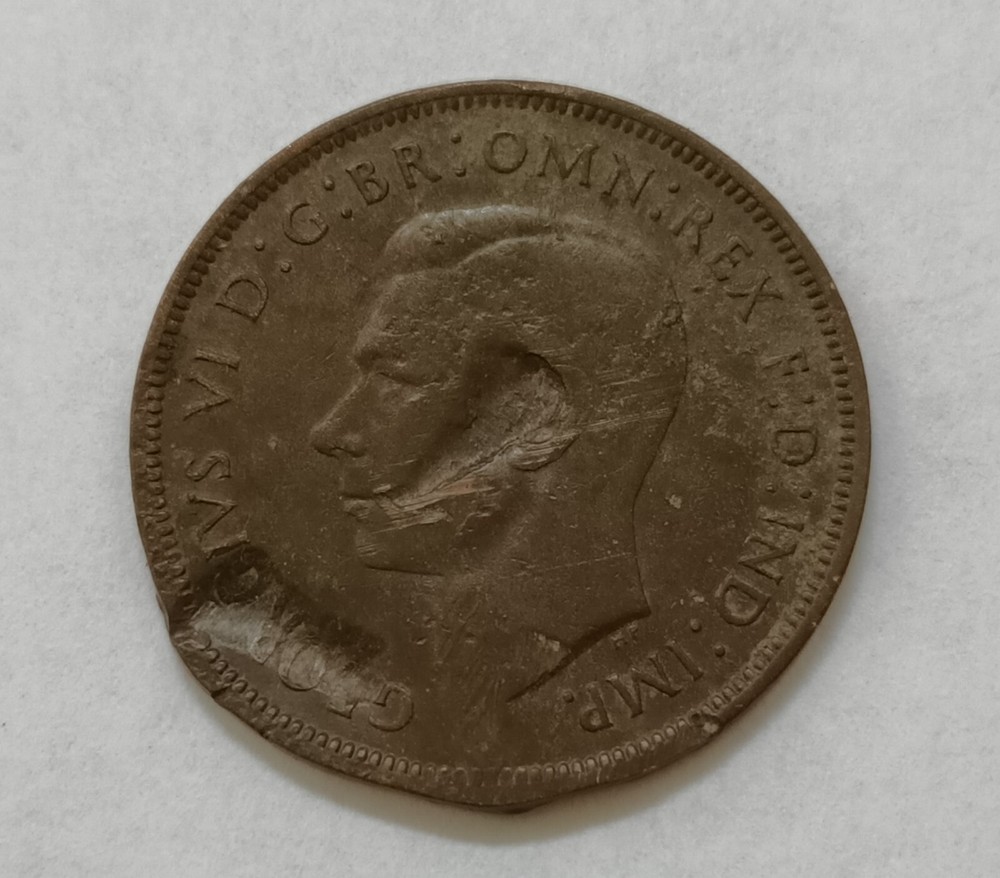George V and George VI coins with error