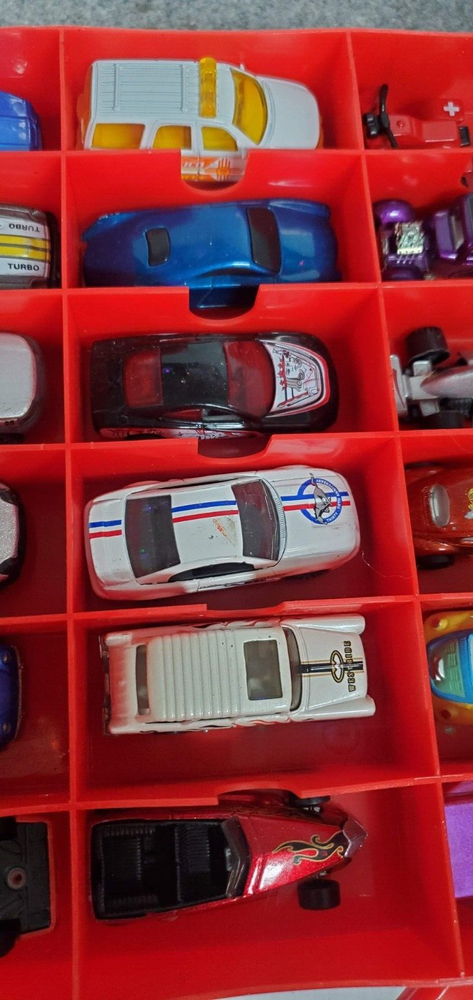 45 Hot Wheels/Hasbro/Misc vehicles in Plastic Red storage case.