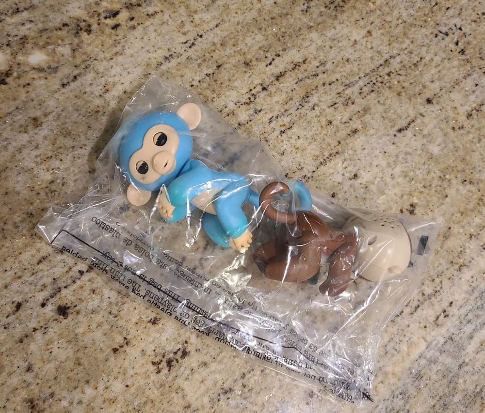2 Fingerlings Interactive Baby Monkey Blue Brown Toys. Both work tested.