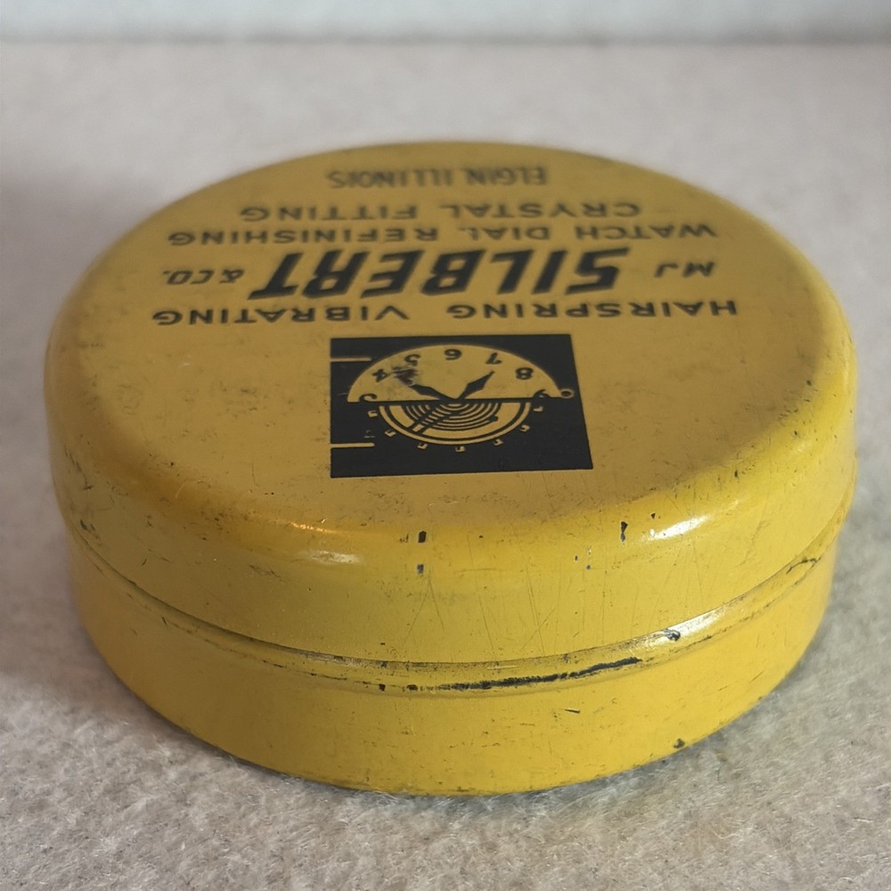 1950’s Silvery Watch Tin Container 2 Inch Diameter
