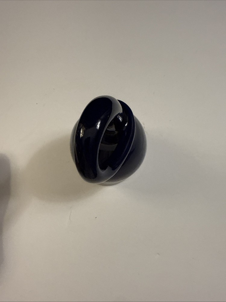 Handmade studio pottery drinking horn with a looped handle.