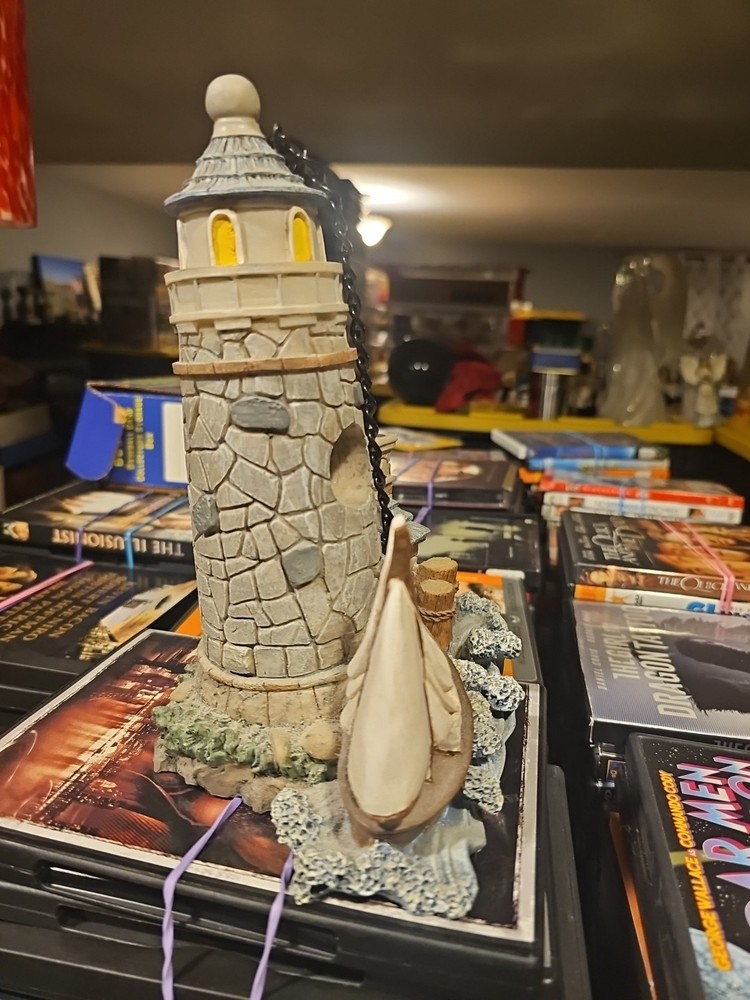 Graystone Lighthouse Sailboat And Waves With Hanging Chain