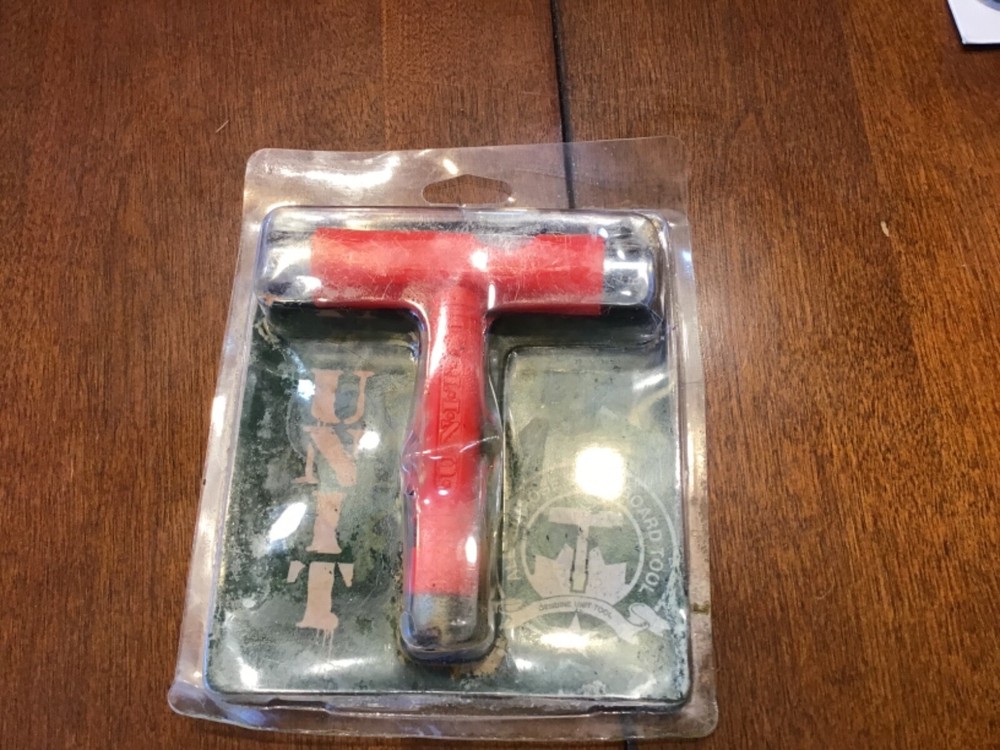 unit all purpose skateboard tool New in package red