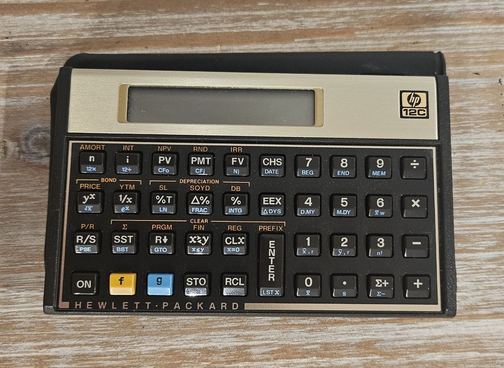 Working Hewlett Packard HP 12C Calculator With Protective Sleeve Case