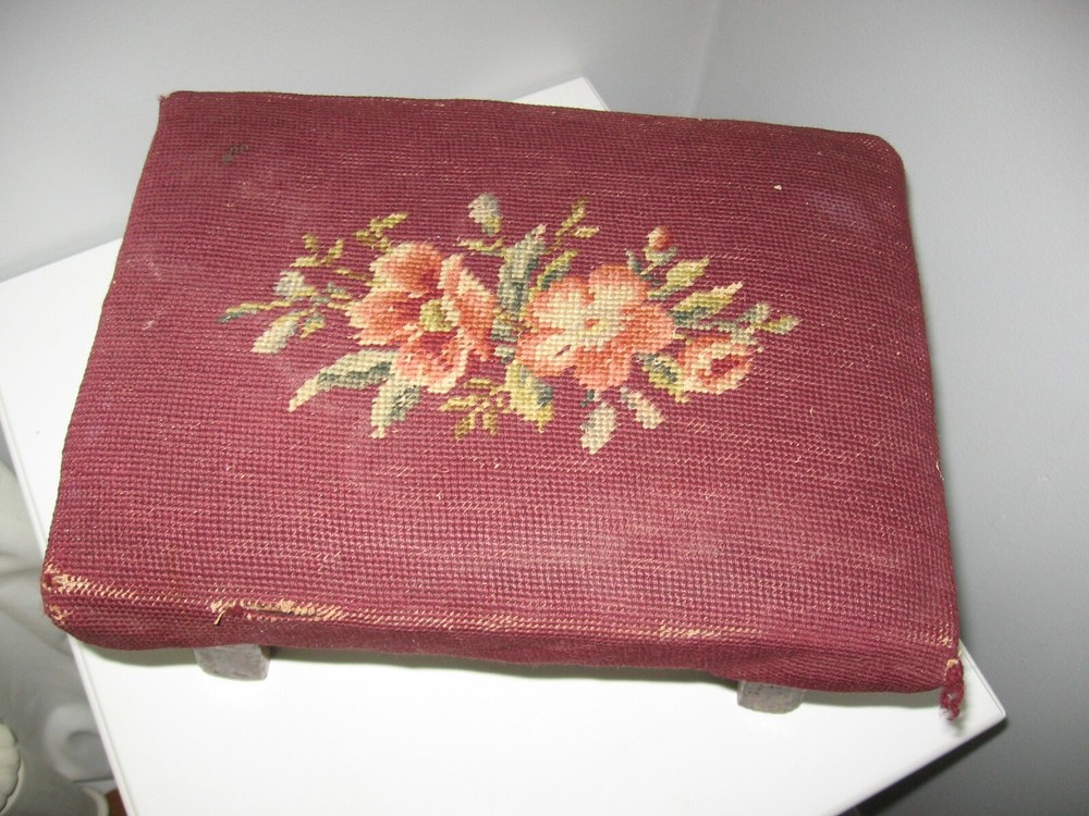 antique wood 4 legged foot stool with needlework top